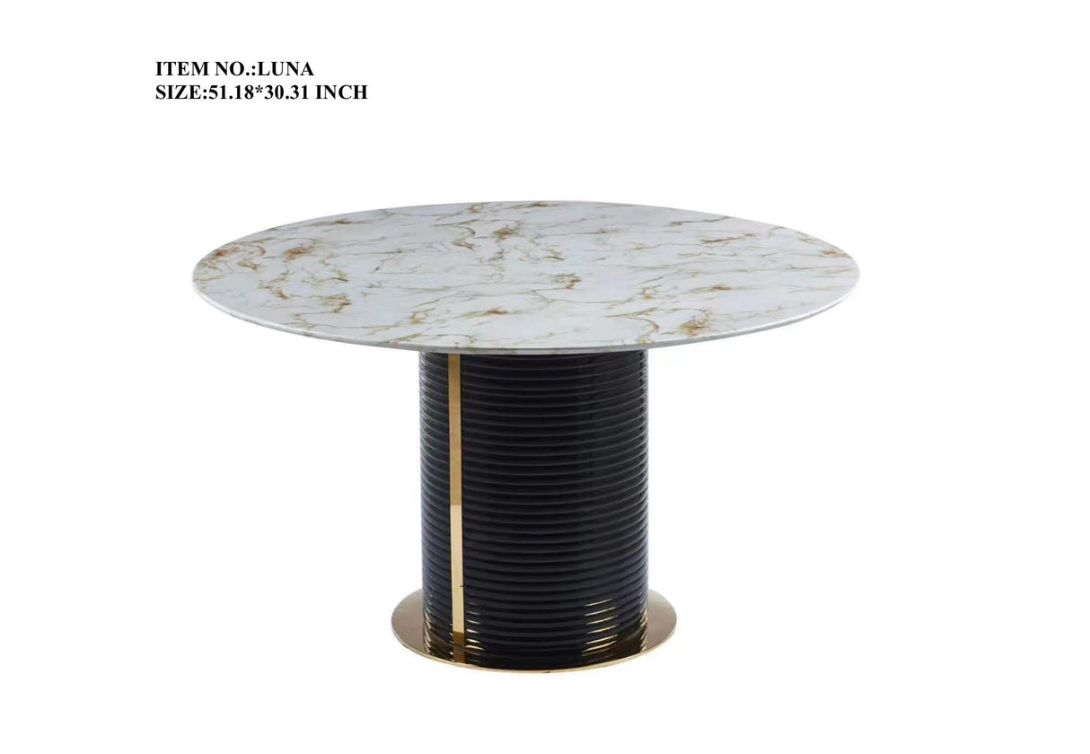 FOAK Luna circular dining table with white marble-inspired top and gold-accented pedestal base.