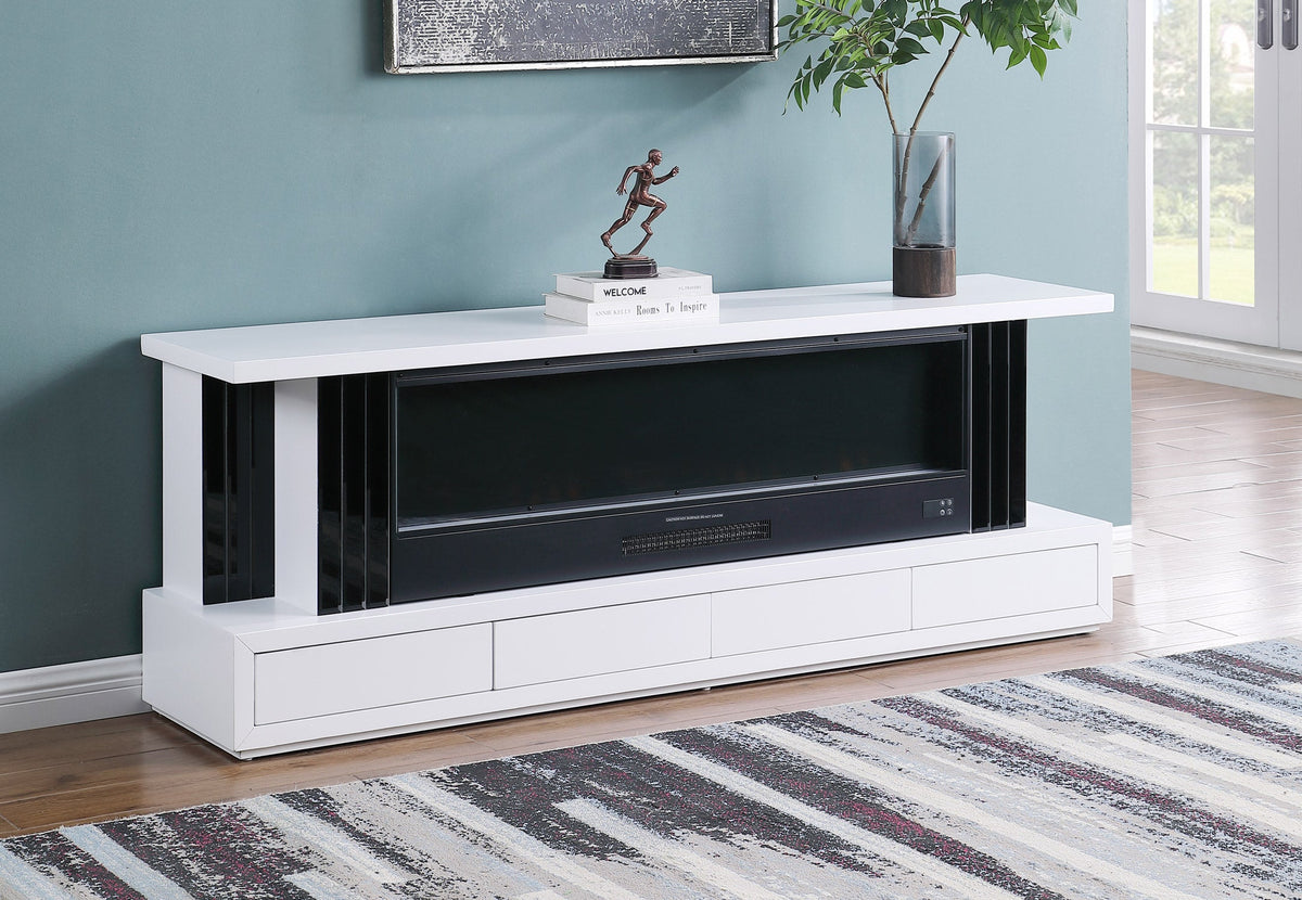 Detail view of the stainless steel accents and four storage drawers on a modern TV stand.