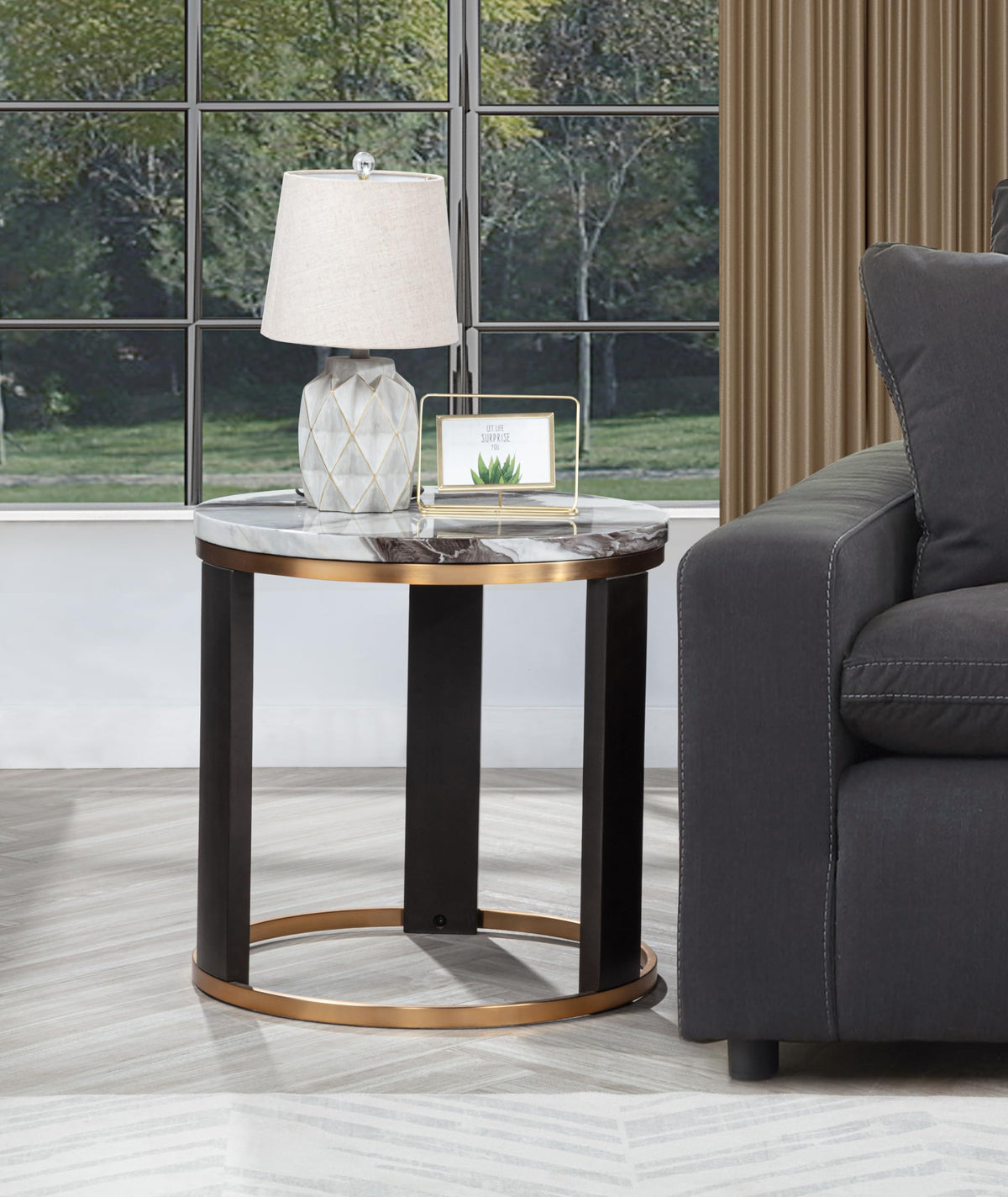 Tvano 24" Round End Table in Icelandic Ivory - front view
