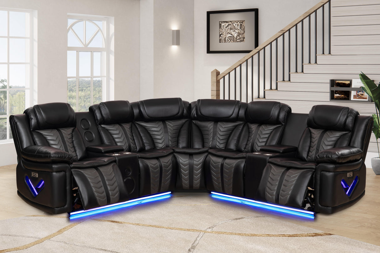 Alissa modern black corduroy sectional sofa with matching rectangular ottoman in a minimalist living room setting.