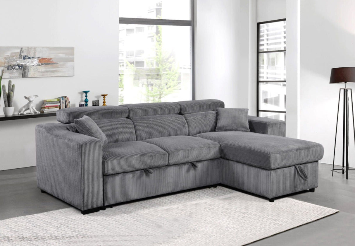 The velvet sectional arranged in a spacious family room layout