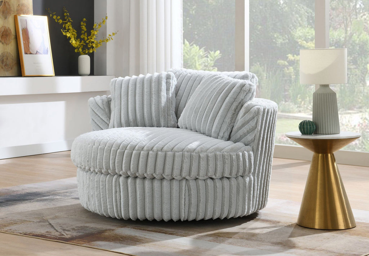 Side profile of the contemporary lounger highlighting the low-profile swivel base.