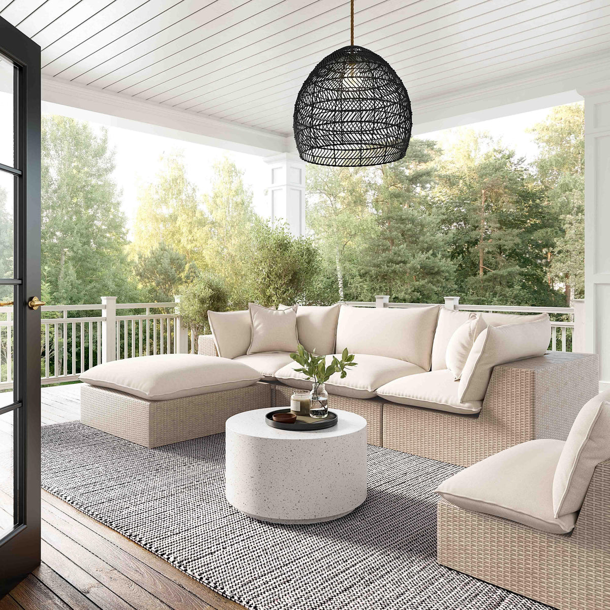 Angled perspective of Cream Fabric and Natural Wicker Cali Outdoor Ottoman