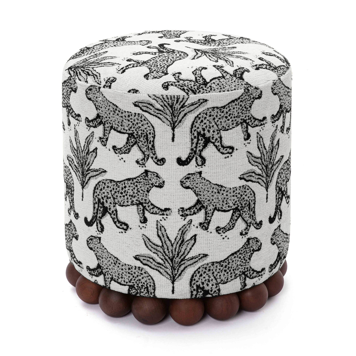 Dex versatile footstool styled with decorative throw blanket