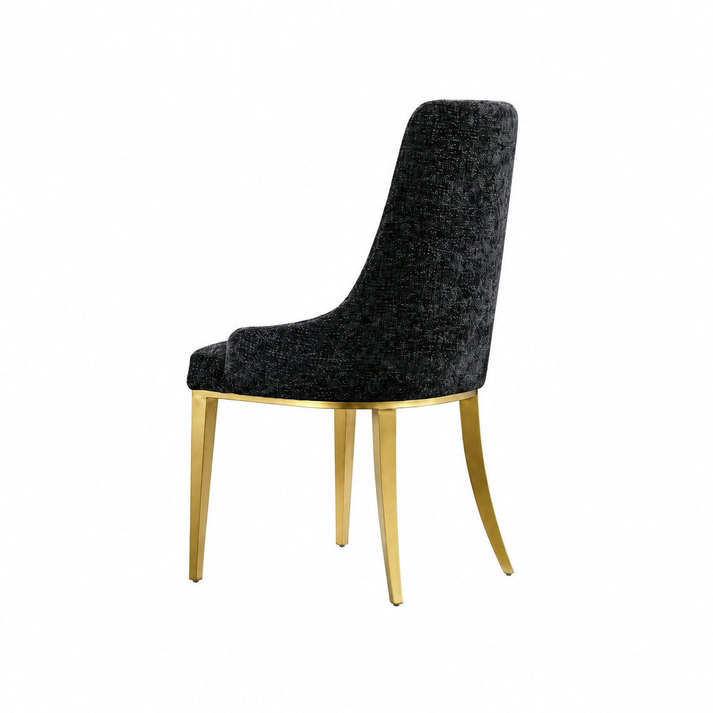Side profile of Stylus contemporary dining chair showing the curved silhouette and flared gold legs.