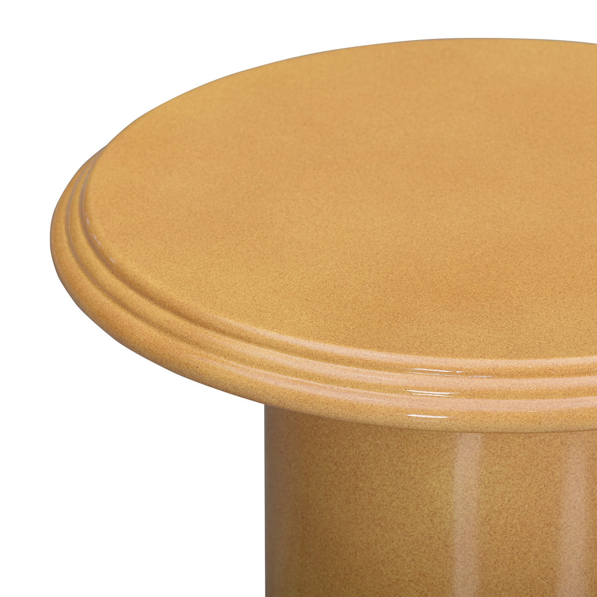Top down view of the circular concrete tabletop on the Tate outdoor drink table