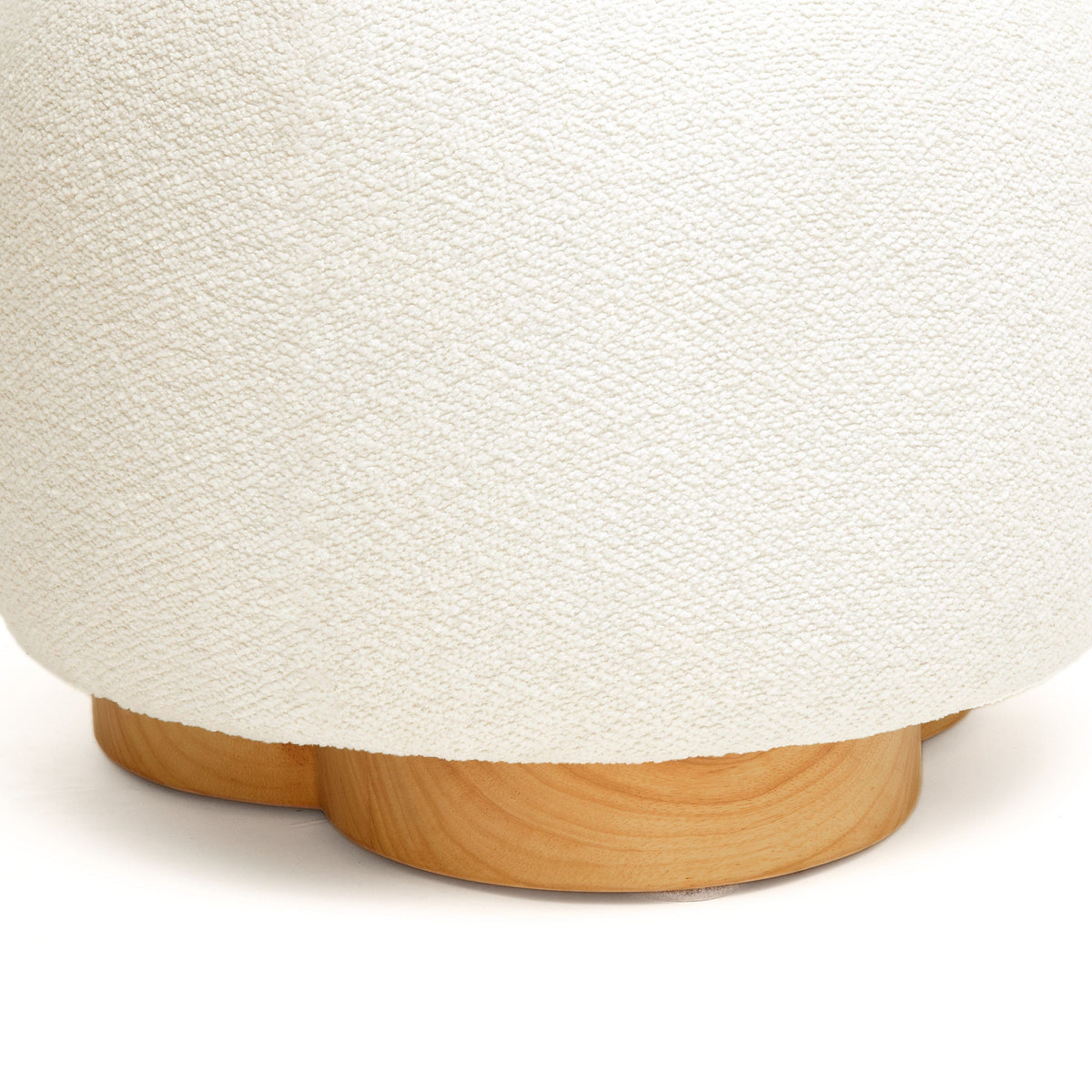 Oopa Swivel Ottoman showing solid structure under hand compression