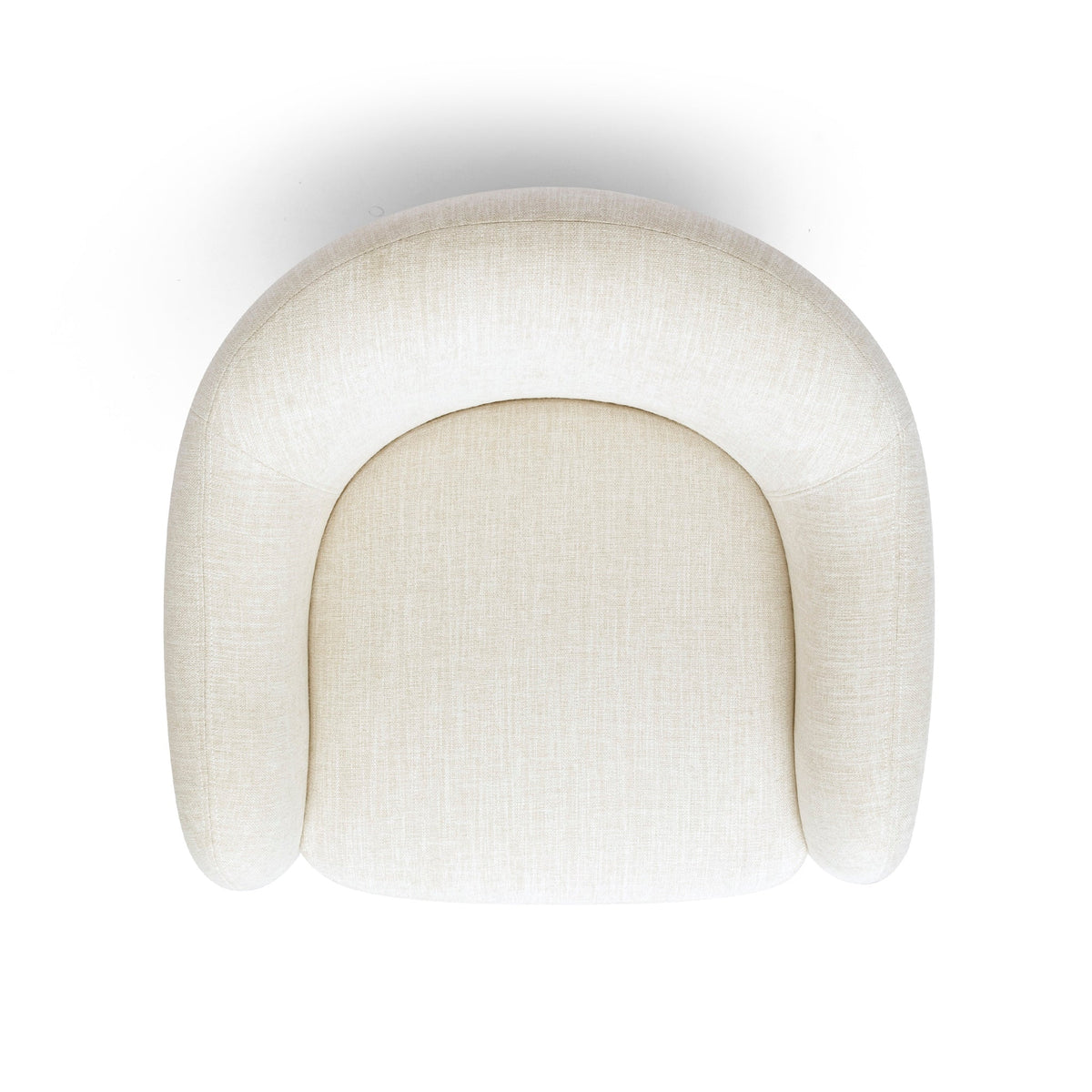 FOAK Salma swivel armchair placed in a cozy bedroom reading corner