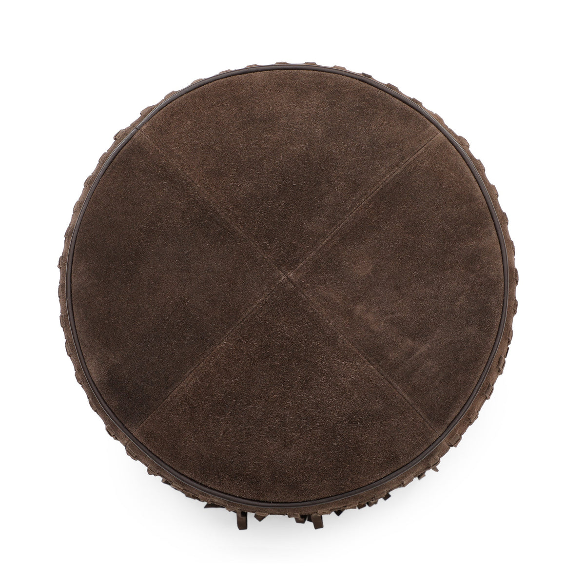 Cognac suede round ottoman showing base construction and fringe fall