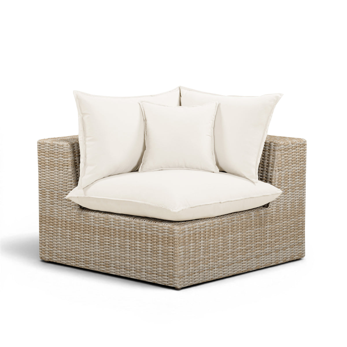 Cali wicker corner chair positioned as an individual outdoor accent seat