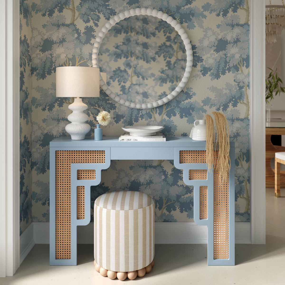 Dex circular footstool displayed on patterned area rug