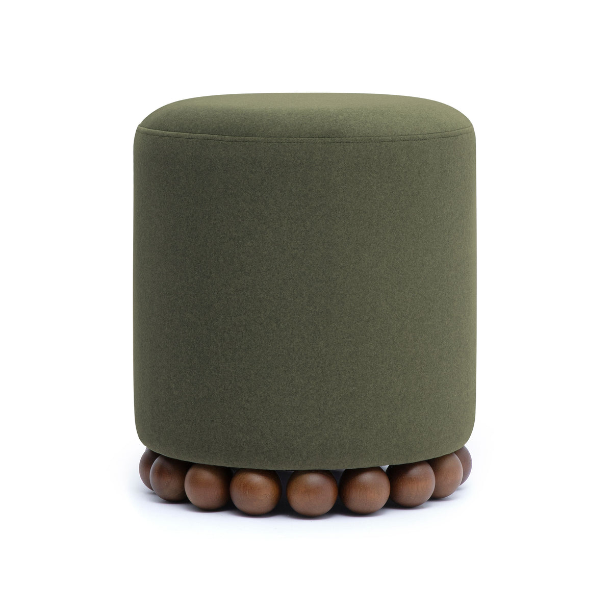 Dex round ottoman styled alongside accent side table