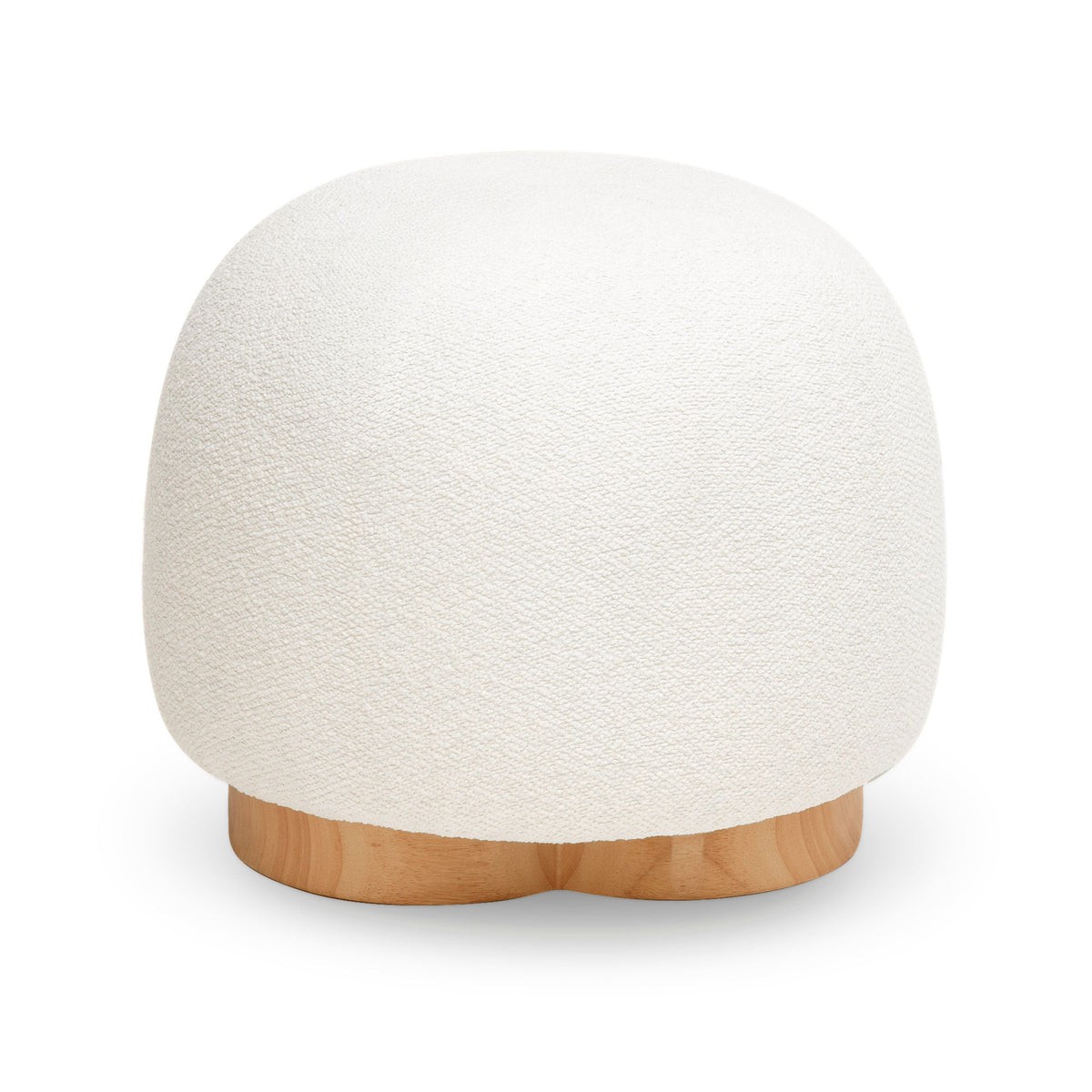 Oopa Swivel Ottoman situated next to a modern standing floor lamp