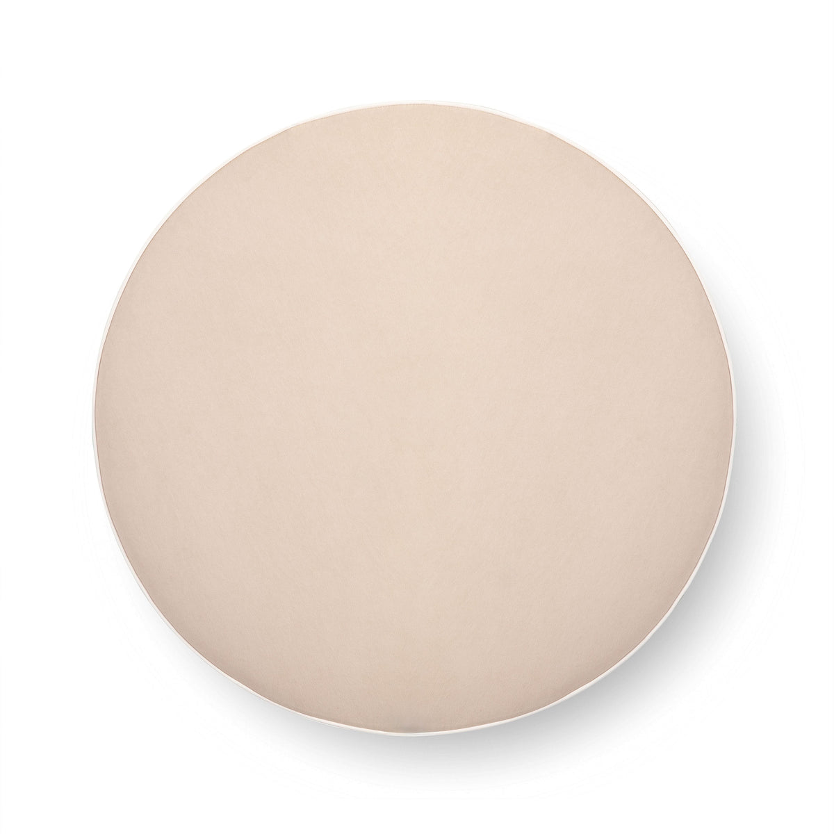 Neutral floral Tassy Round Ottoman angled perspective showing patterned upholstery