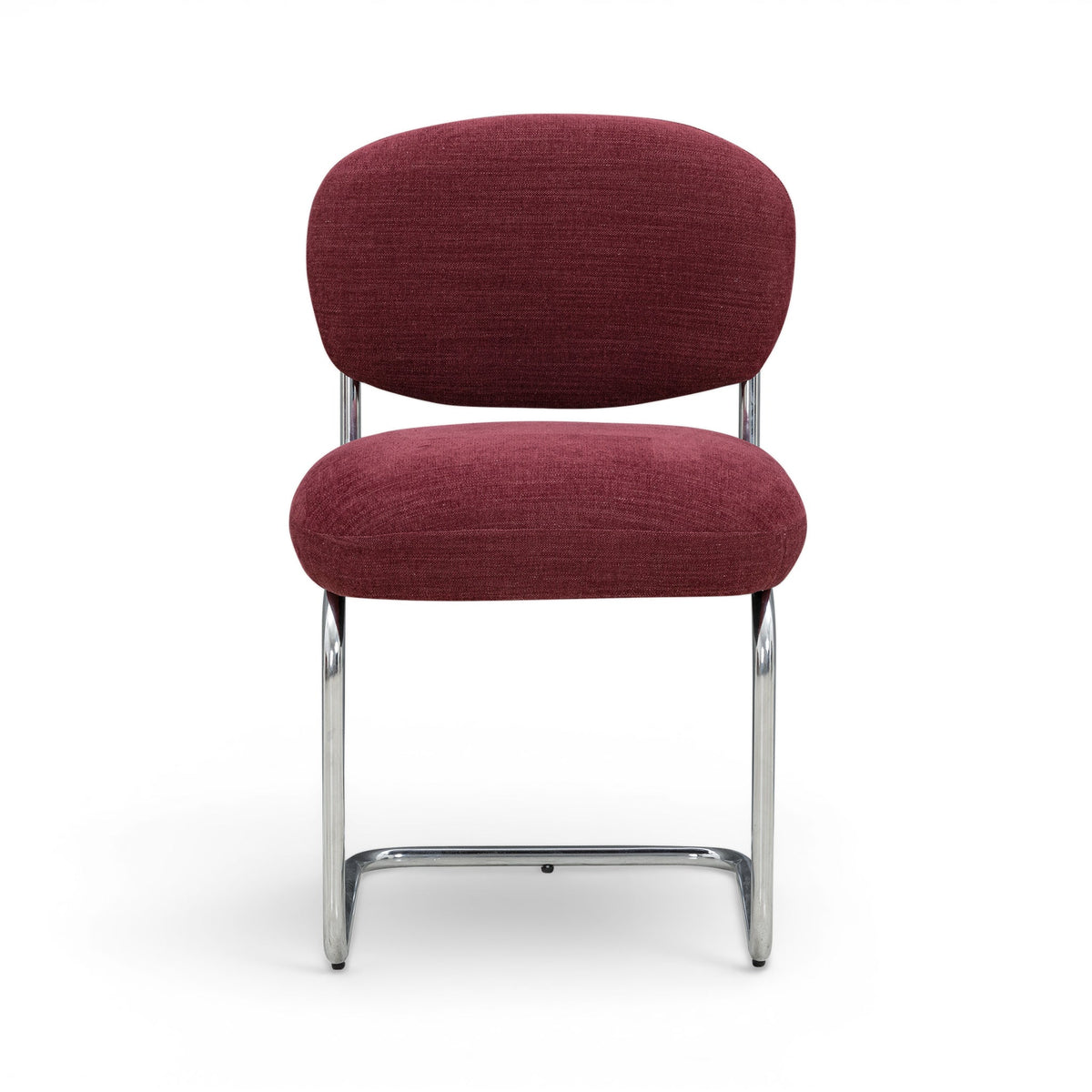 Side angle close-up of Becky chair backrest pill silhouette and fabric weave