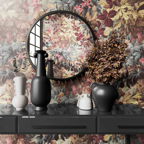 Modern home decor setup featuring Adonis ceramic vases and a Santana black glass console table against a vintage floral wallpaper background.