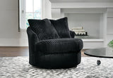 The Ava accent chair styled in a modern living room environment.