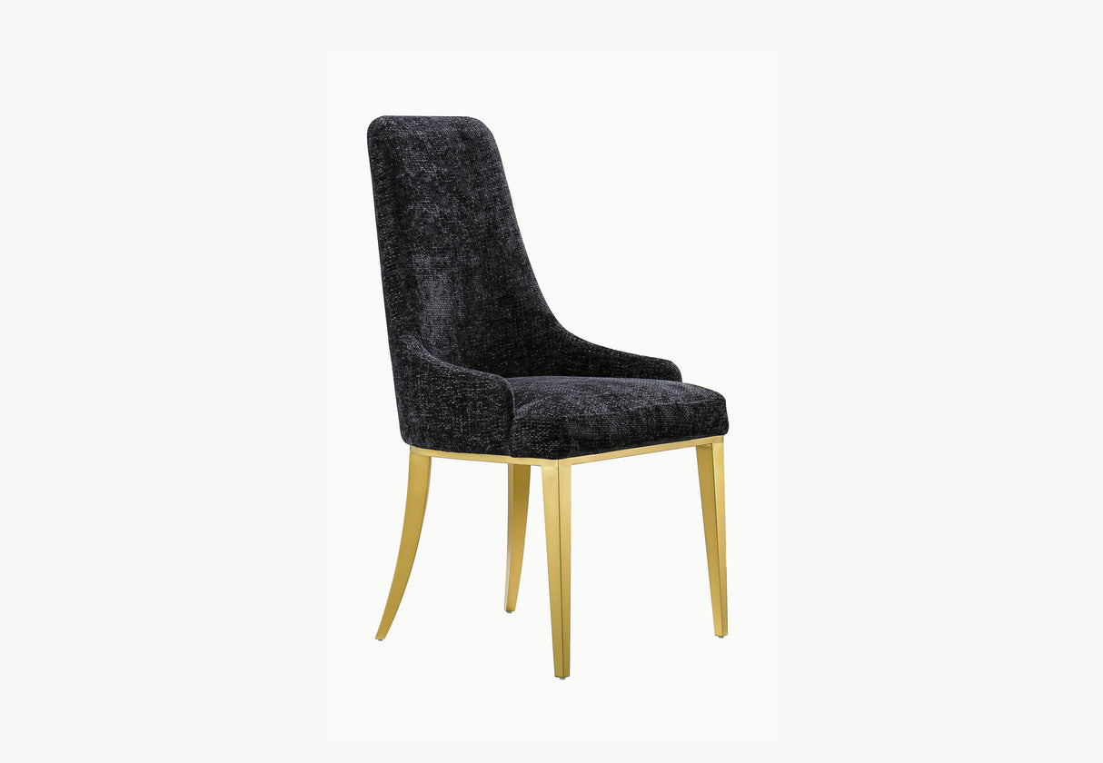 Front view of Stylus high-back dining chair in black textured fabric with gold metal legs.