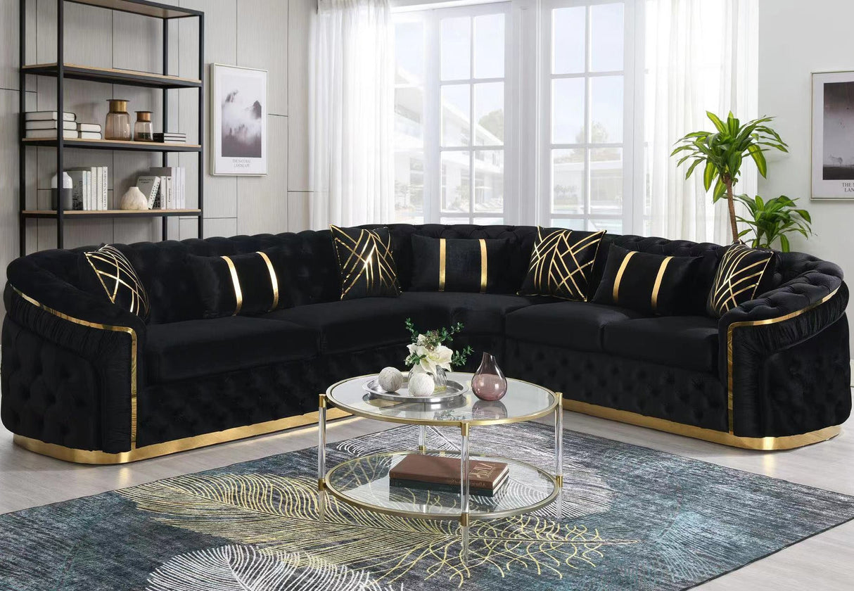 Contemporary corner sectional upholstered in gray velvet featuring gold base accents