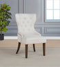 Baney Ridgewell Dining Collection - Trestle Extension or Round Pedestal Table, Tufted Wingback Chairs in Dark Oak - lifestyle