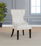 Baney Extension Dining Collection - Distressed Black Trestle Table, Round Pedestal Table, Sideboard & Wingback Chairs - lifestyle