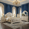 Luxurious bedroom with ornate furniture, chandelier, and decorative elements.