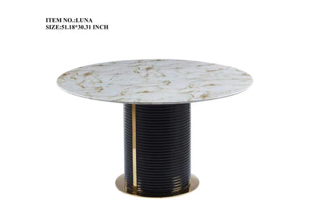FOAK Luna circular dining table with white marble-inspired top and gold-accented pedestal base.