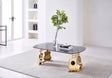 Majestic Coffee Table featuring a golden metal frame shaped like guitar silhouettes with a sleek black glass tabletop.