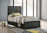 Cavelle Upholstered Panel Bed & Bedroom Sets - Charcoal Chenille Headboard with Burnished Black Frame & Brass Knobs – view 1