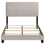 Boyd Upholstered Panel Bed with Chrome Nailhead Trim - Ivory Fabric & Black Legs, Twin to California King – view 13