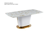 Close-up of FOAK Sofia dining table showing rectangular marble tabletop and gold-finished base accents.