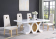 Detail view of the FOAK high-gloss white tabletop surface and gold structural metal frame.