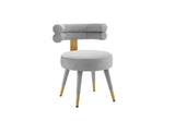 Close-up detail of the light blue performance velvet and cylindrical backrest geometry.