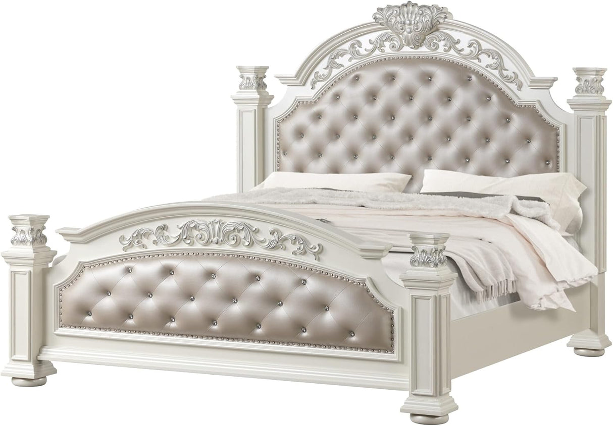 An ornate white and champagne tufted bed frame with decorative carved details and a padded headboard, shown on a white background with white bedding.