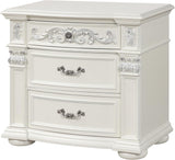 A white two-drawer nightstand with ornate silver scrollwork details on the drawer fronts and sides, featuring decorative carved panels and silver metal handles.