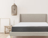 Gray Upholstered Bed with Angled Brass Legs – image 1