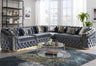 Gray velvet l-shaped sectional sofa with deep button tufting and gold metal legs