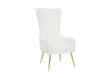 Side profile of the Blair modern armchair showing the curved backrest.