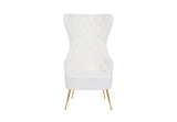 Full-view gray velvet seating with gold architectural legs