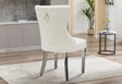 Front view of the cream velvet dining chair with gold tufted backrest and legs
