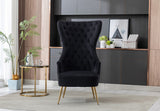 Gray velvet vanity chair with gold hardware accents