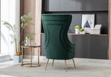 Rear view of the gray velvet chair showcasing smooth upholstery