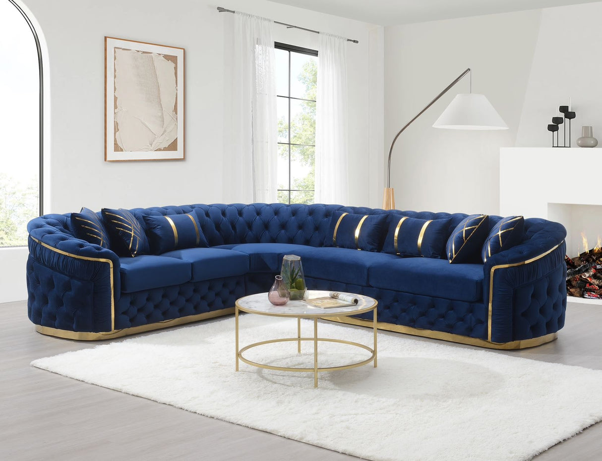Side view of FOAK gray velvet sectional showing l-shaped configuration and gold legs