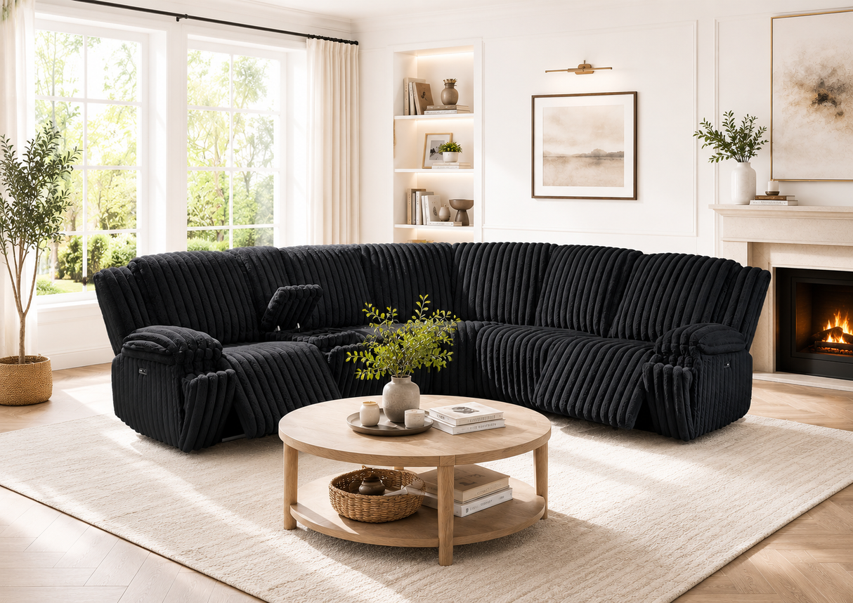 Side profile of the reclining mechanism and padded armrests on the FOAK black fabric sectional.
