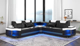 Angled view of the Sabrina LED sectional showing the high-contrast upholstery and modern silhouette.