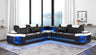 Angled view of the Sabrina LED sectional showing the high-contrast upholstery and modern silhouette.