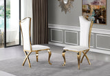Set of Perry velvet dining chairs in a modern dining room setting