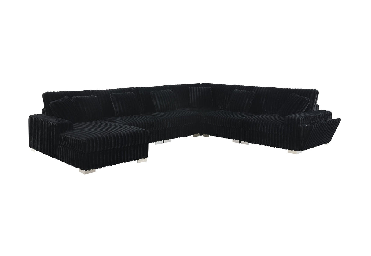 Lounge area featuring deep brown shaggy velvet furniture