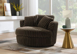 Front view of the Ava swivel chair showing the rounded backrest and ribbed velvet texture.