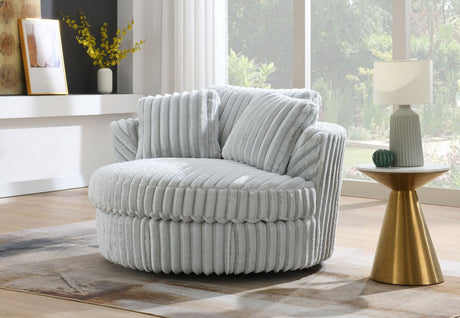 Side profile of the contemporary lounger highlighting the low-profile swivel base.